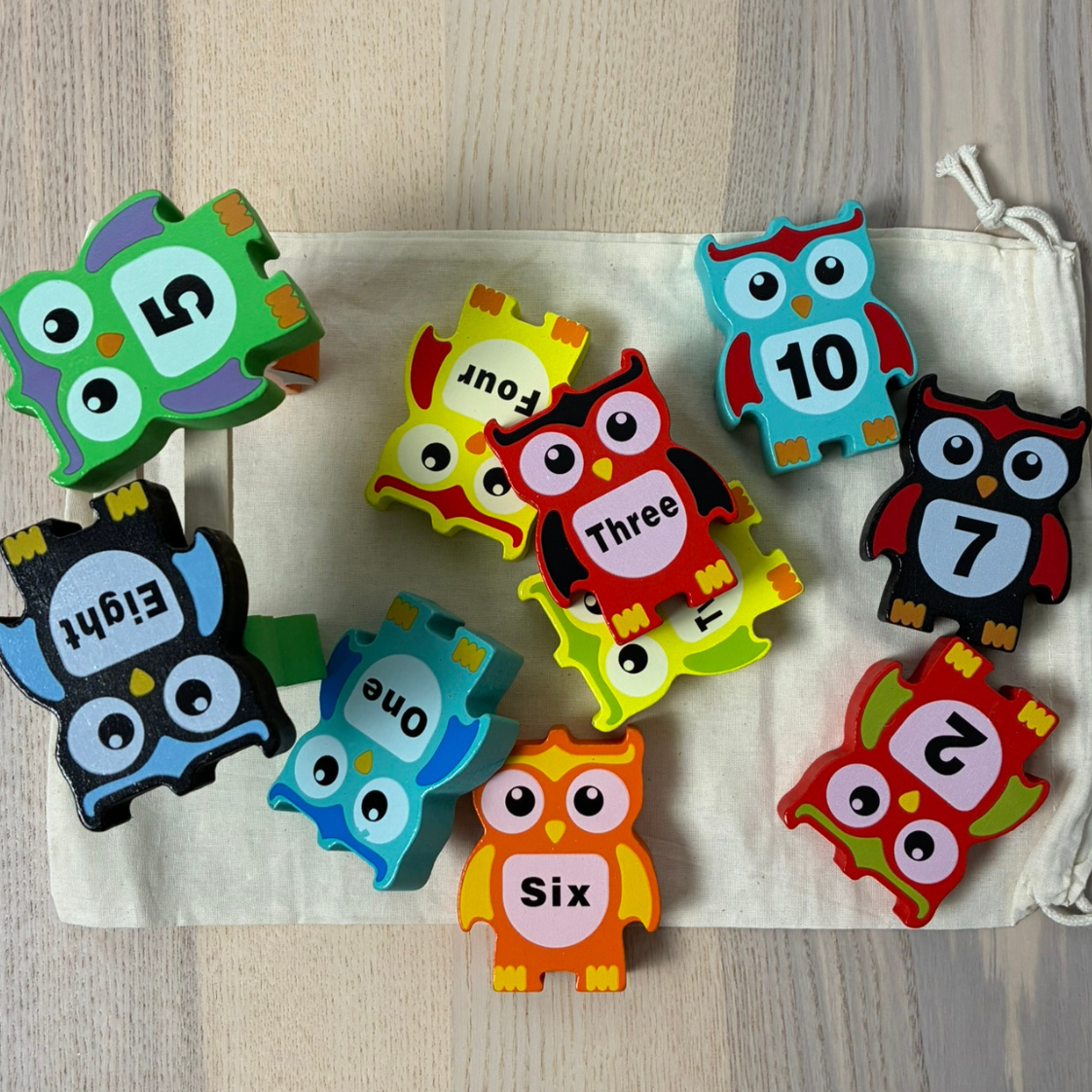 Bunte Holz-Stapelsteine in Eulenform incl. Aufbewahrungsbeutel